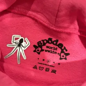 Sp5der PNK V2 Hoodie Pink – stylish streetwear unisex hoodie in pink color Спросить ChatGPT